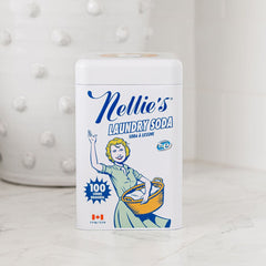 Image of a tin of Nellie's Laundry Soda on a white counter.